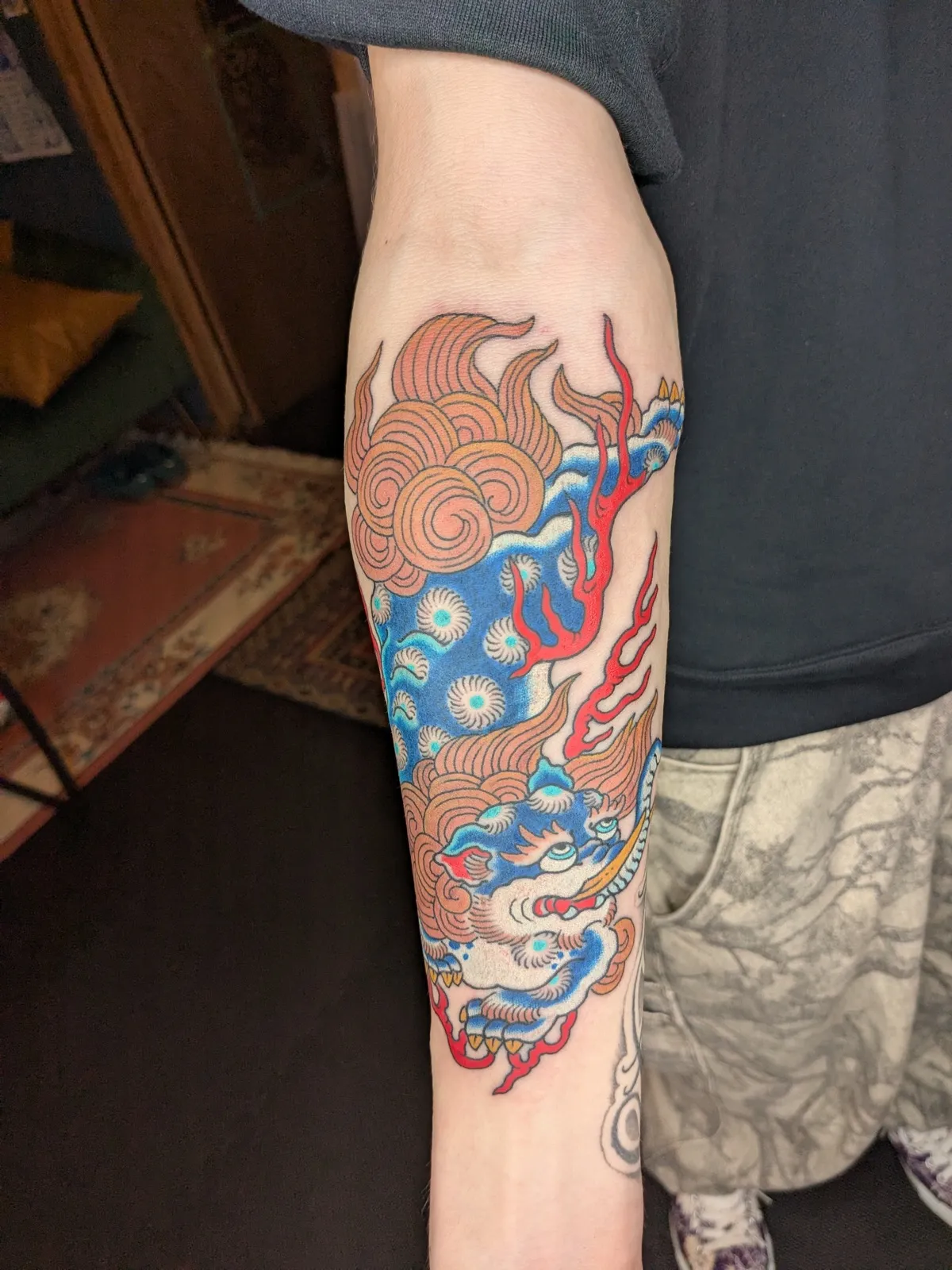 Baku tattoo on the forearm