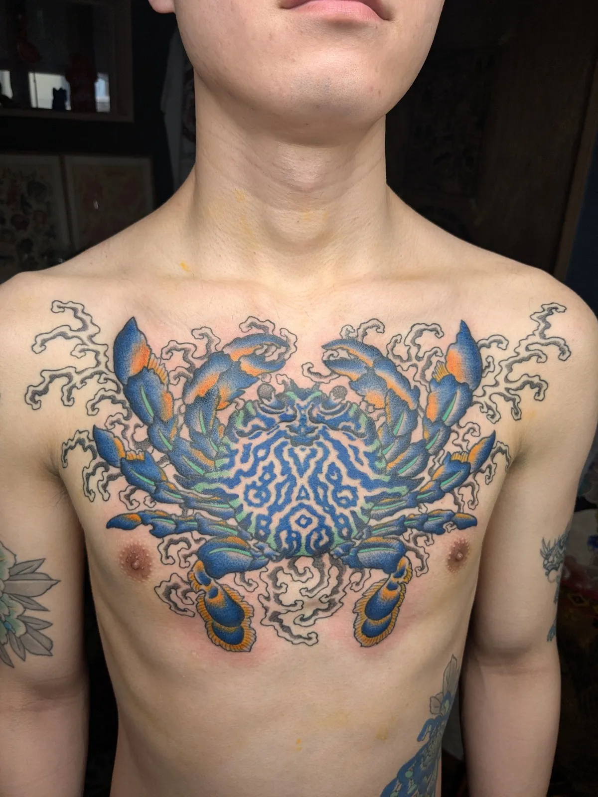 Crab tattoo on the chest