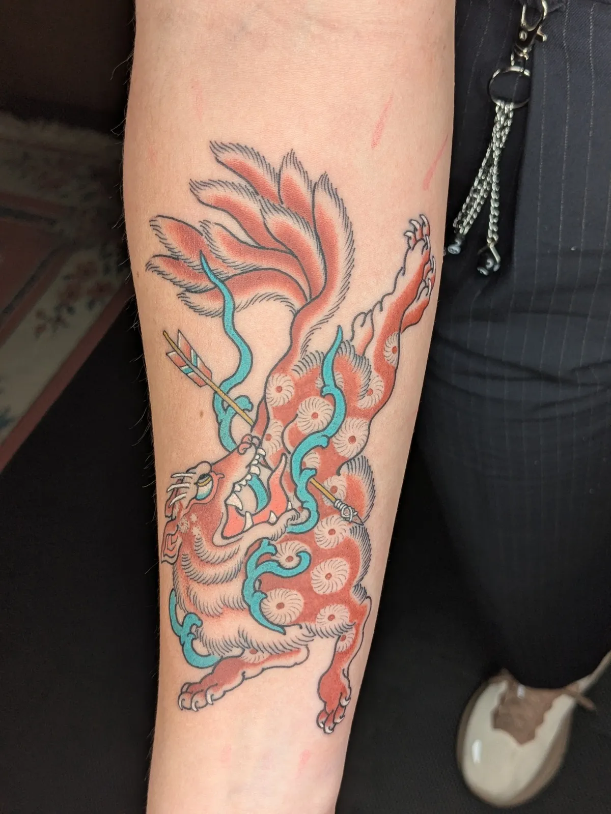 Fox tattoo on the forearm