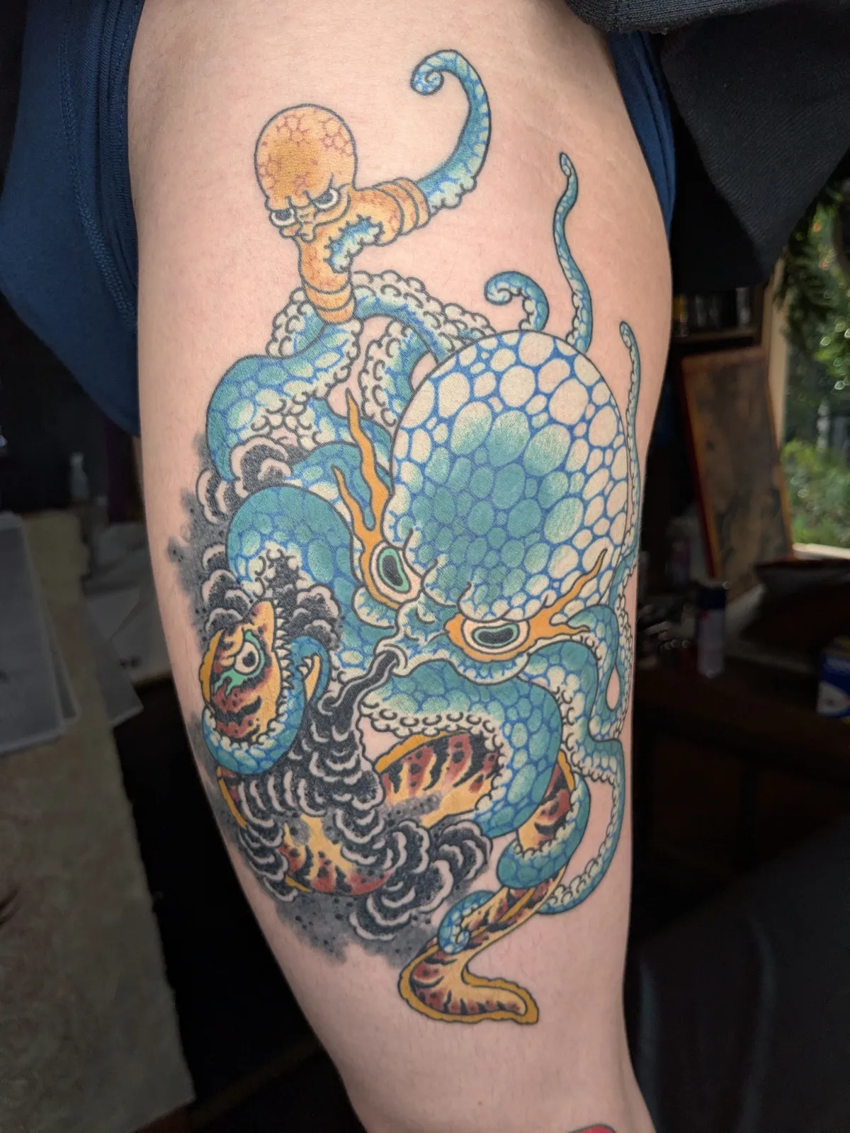 Octopus tattoo on the upper arm