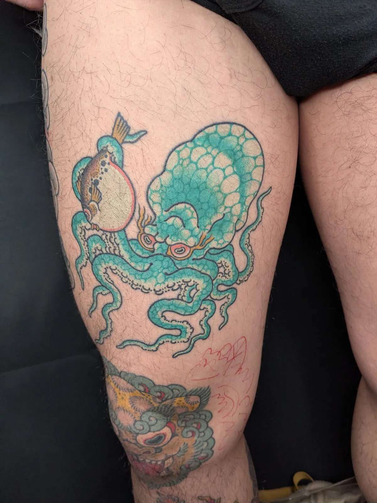 Octopus tattoo on the thigh