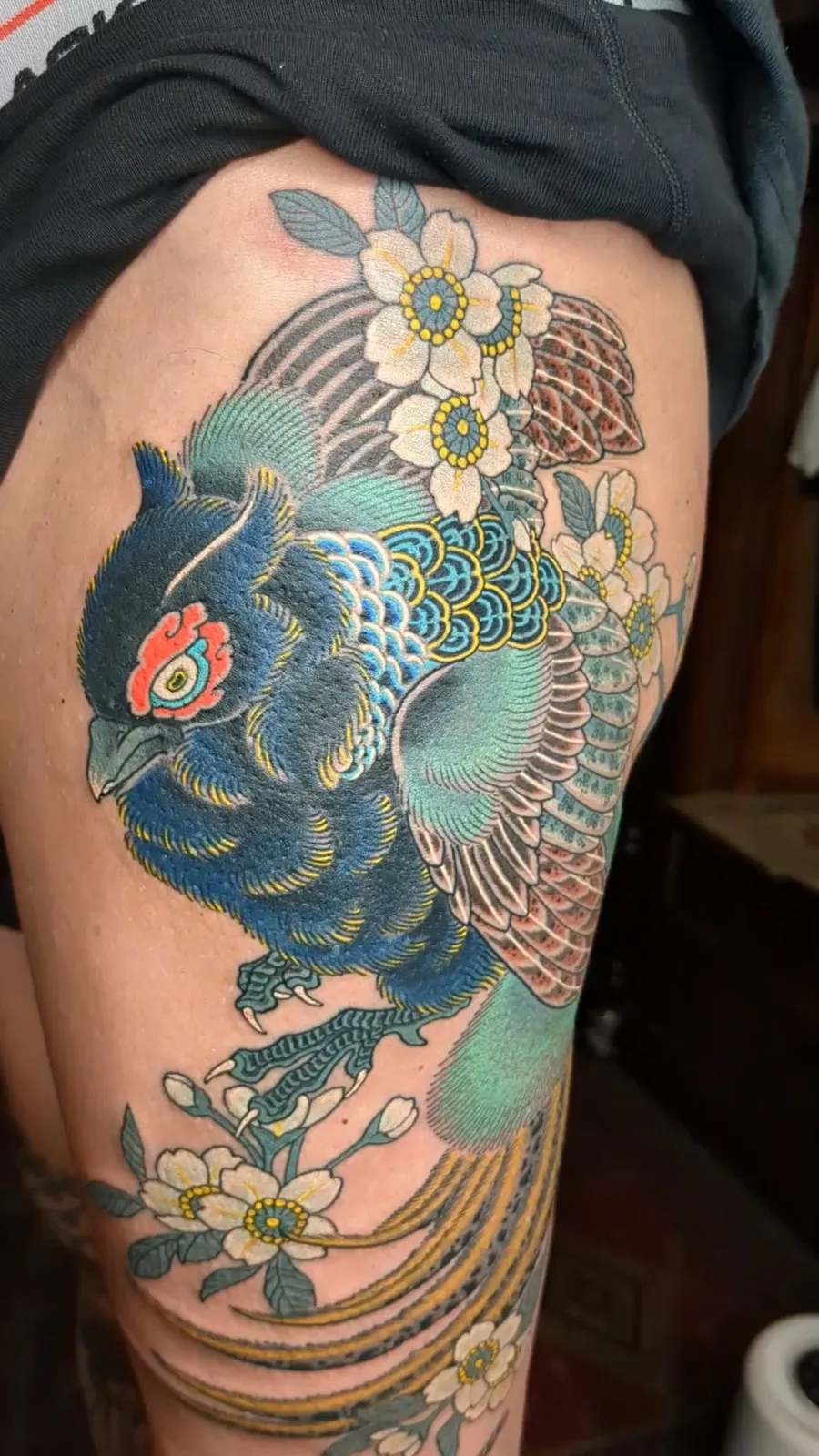 Pheasant tattoo on the thigh