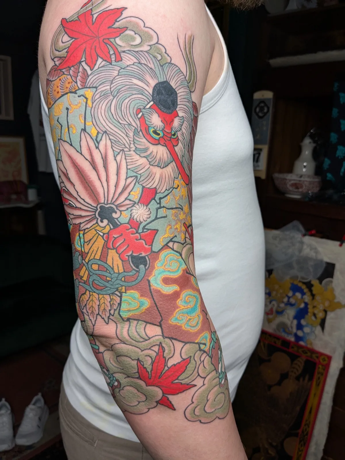 Tengu tattoo on the upper arm