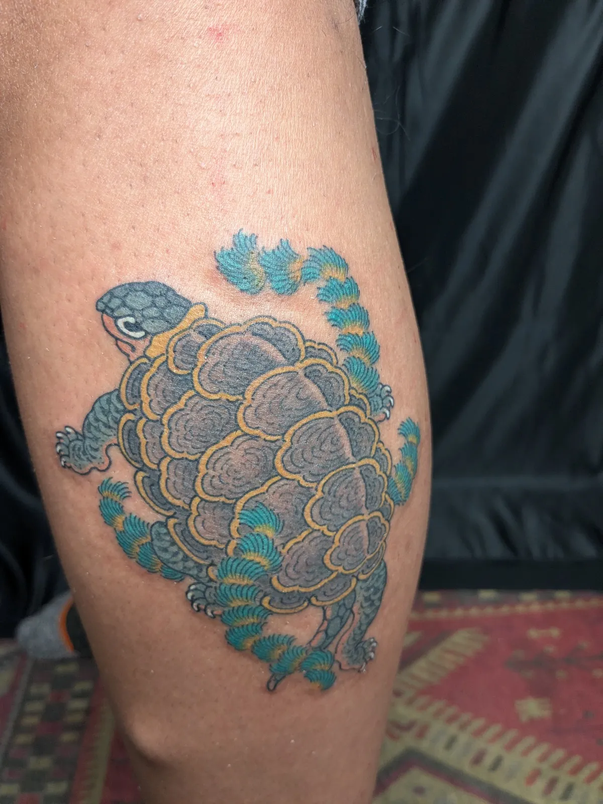 Turtle tattoo on the calf