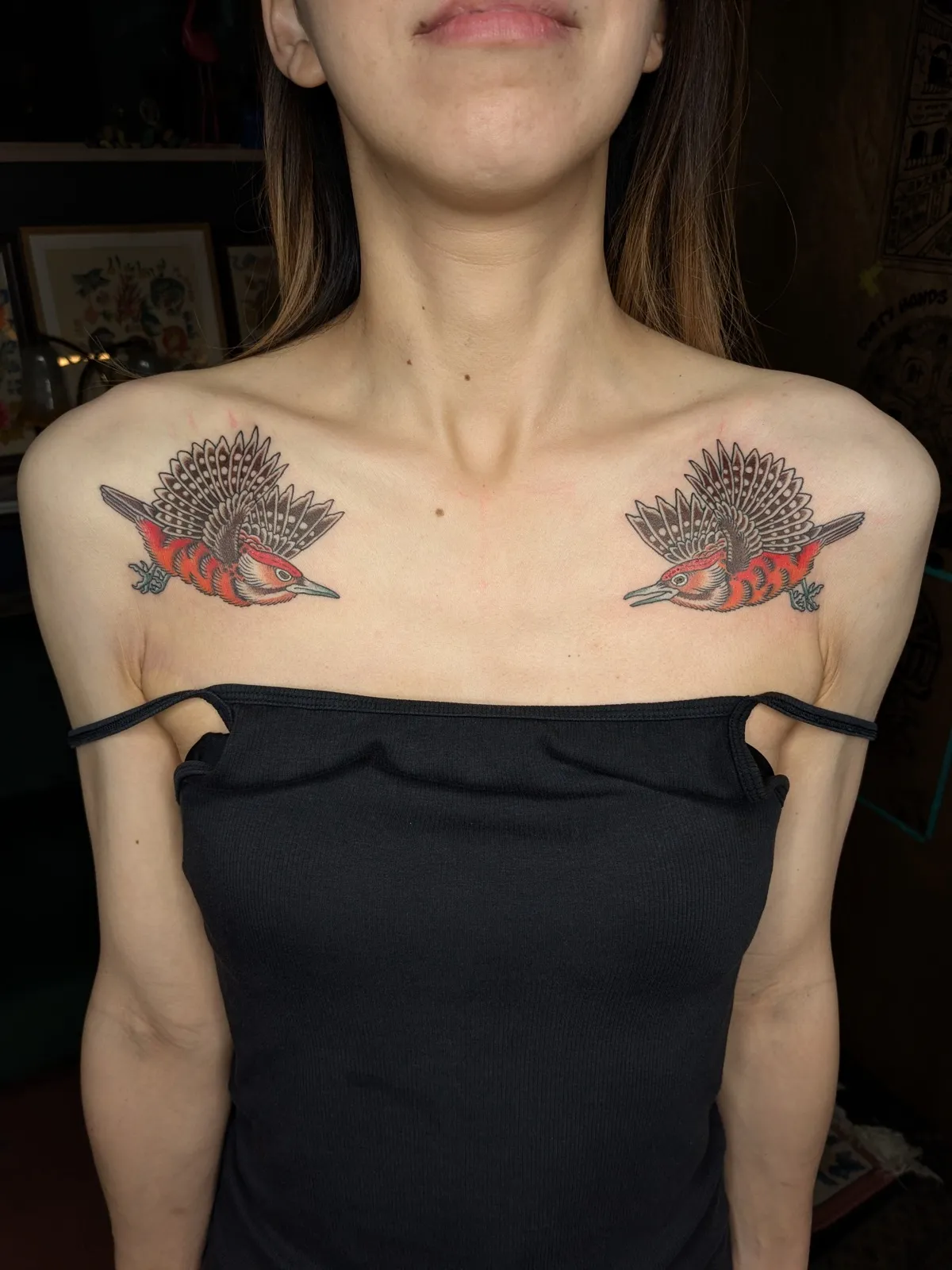Pair of Okinawa woodpeckers tattoo on the chest